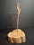 Up for sale is a bench-forged wrought iron combination rushlight holder and candle socket mounted on a heavy slab wood...