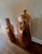 A pair of large decorative vases. Liquid gold finish. Very distinctive and lovely Vases in good condition. Some...