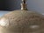 This table lamp is made of glazed ceramic in the style of Roger Capron, reminiscent of the pottery associated with...