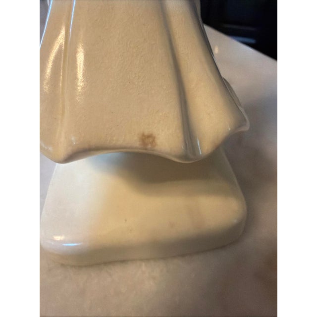 The Cowan Art Pottery Bookend featuring the Sunbonnet Girl design is a vintage original piece from 1929. Made of clay with...