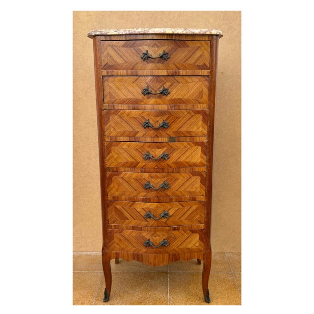 Super quality French Louis XV Style marquetry tall chest of seven drawers with original marble top and original ormolu...