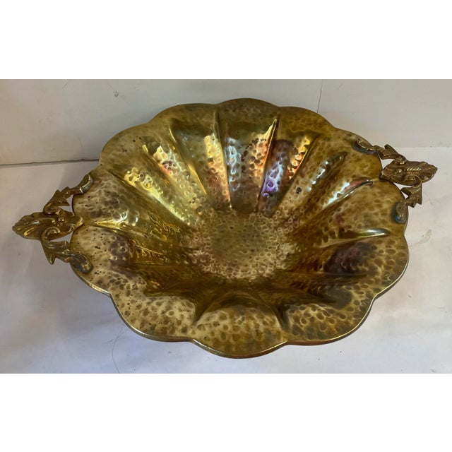 Beautiful brass decorative centerpiece footed bowl with decorative handles.