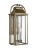 The Sean Lavin Wellsworth three light outdoor wall fixture in painted distressed brass creates a warm and inviting welcome...