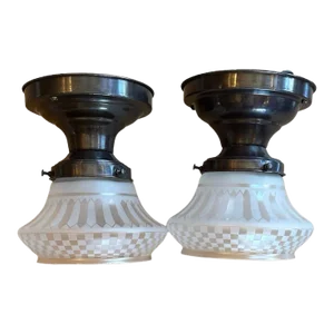 Pair of Frosted and Etched Check and Ribbon Pattern Glass Flush Mounts on Brass Holders, Circa 1920