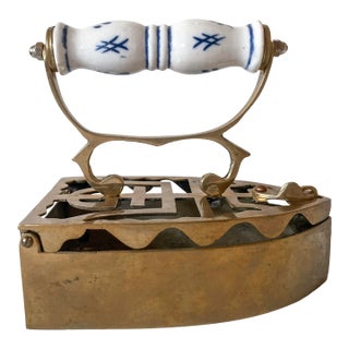 Mid-1900s Shōwa Era Japanese Brass Coal Iron With Blue and White Porcelain Handle For Sale