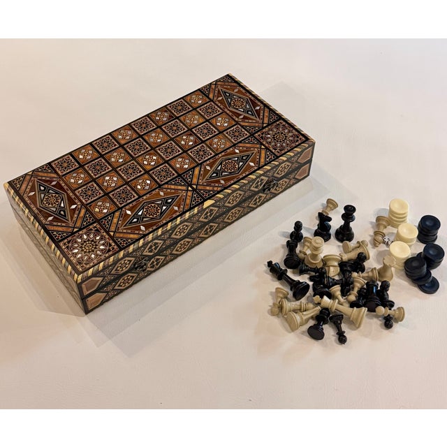 Exceptional handcrafted backgammon and chess set from Damascus, expertly inlaid with natural mother of pearl. Created...