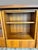 Stunning vintage mid-century modern teak entertainment center/hutch manufactured by Sun Cabinet. The cabinet has a warm...