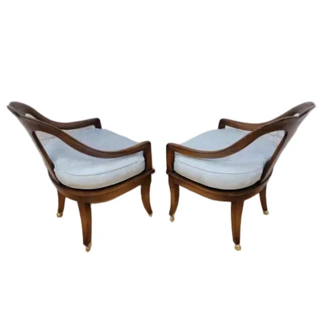 Vintage Regency Neoclassical Style Klismos Style Walnut Chairs - Set of 4 Elegant vintage armchair crafted in the Regency...