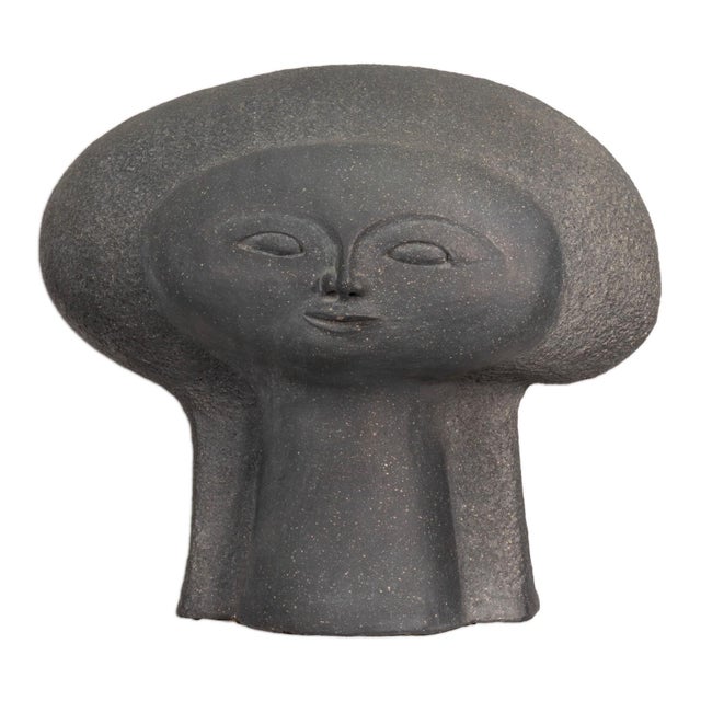 A sculptural work from the "Heads of the Universe" series designed by Paul Bellardo for Austin Productions. Characterized...