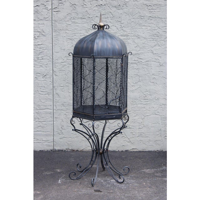High Quality Vintage Wrought Iron Garden Bird Cage Raised On A Decorative Scrollwork Stand. Hexagonal Form With Wire Mesh...