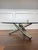 A striking example of late Modernist design, this iconic Jax coffee table by legendary American designer Milo Baughman...