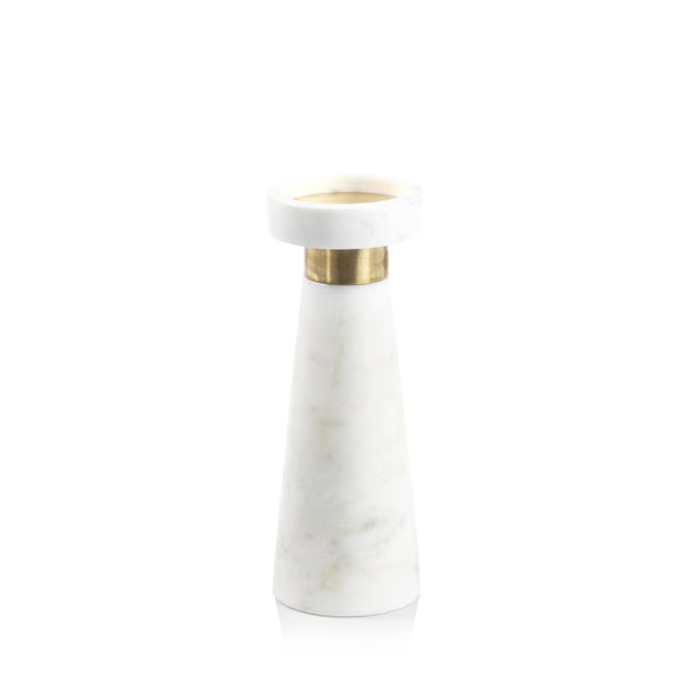Instantly add a touch of modern class to your space with this marble pillar candle holder. This beautiful candle holder is...