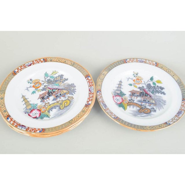 Rörstrand Japan series, set of four dinner plates. Dinner plates in faience with oriental-inspired decoration in...