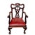 This distinguished set of eight English carved mahogany dining chairs, circa 1870, reflects the refined craftsmanship of...