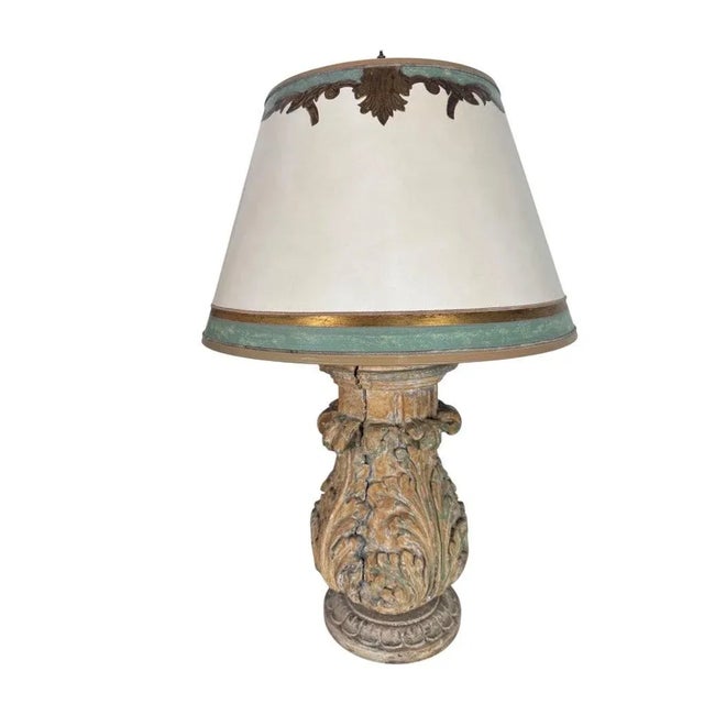 Pair of Italian carved wood urns wired into table lamps in the Baroque style, each with bold foliate and acanthus leaf...