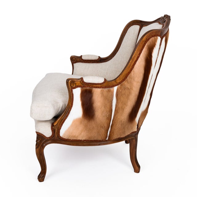 This antique Berger-style chair has been expertly restored and reupholstered in natural color Belgian linen fabric paired...