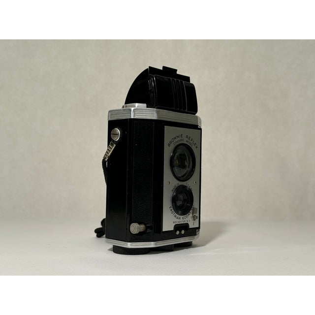 Kodak Eastman: Brownie Reflex Synchro Price Guide: estimate a camera value
