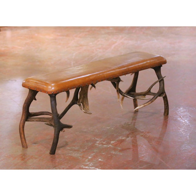 This striking antique Alpine bench was crafted in the Black Forest tradition, likely in Austria’s Tyrolean region, circa...