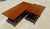 This is a set of two vintage bamboo and walnut-colored wood tables. They have rectangular tops with molded edges sitting...