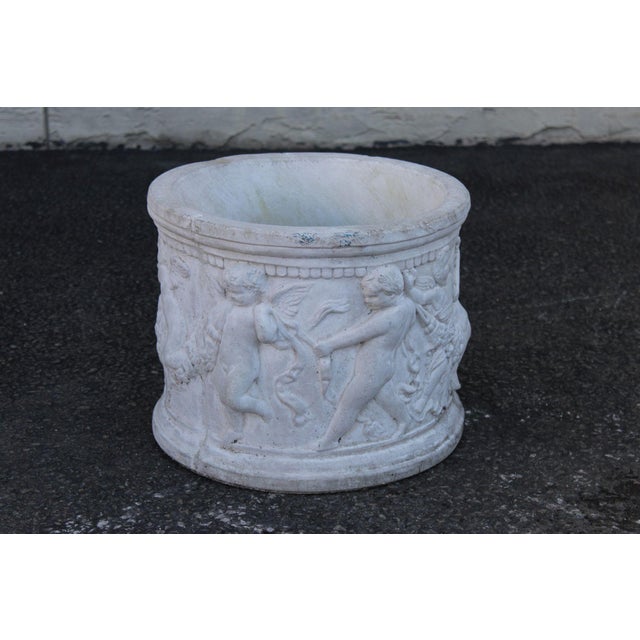 High Quality Classical Style Cast Stone Garden Planter With Relief Decoration Featuring Winged Cherubs Holding Floral...