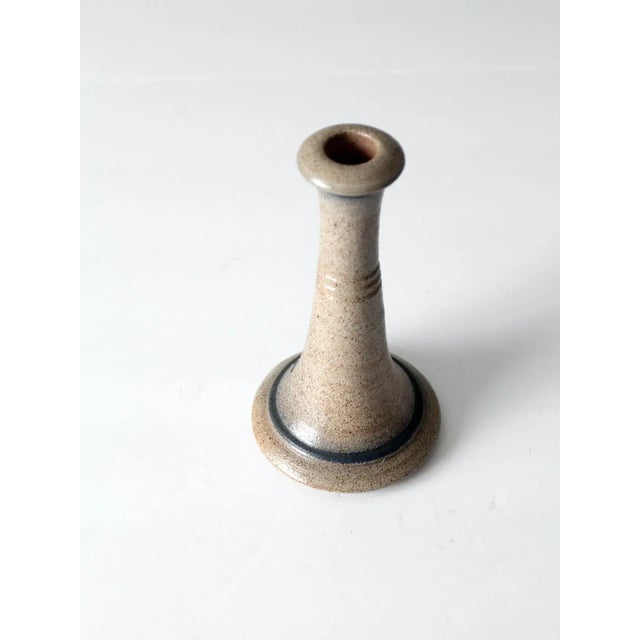 Vintage Rowe Pottery Works candle holder, a studio pottery candlestick featuring a classic salt glaze finish. The piece is...
