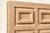 Large headboard in limed wood, featuring a characteristic sandy beige hue. The front panel is structured with ten...