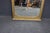 Late 19th century French Louis XVI style floor pier mirror with a carved giltwood frame and original beveled mirror plate....