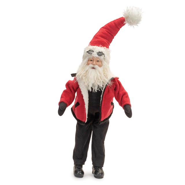 Welcome the holidays with charm and cheer! This 27.75" Snow Suit Santa is the perfect addition to your festive decor....