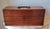 The piece features flat-sided, minimalist cabinetry construction designed for durability. Crafted in the functional...