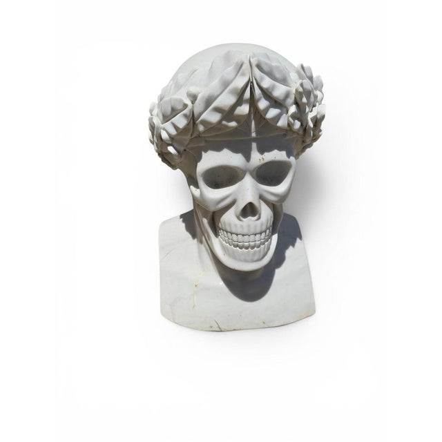 Striking marble bust depicting a Memento Mori, crowned with a laurel wreath and executed in Italy during the 1980s....