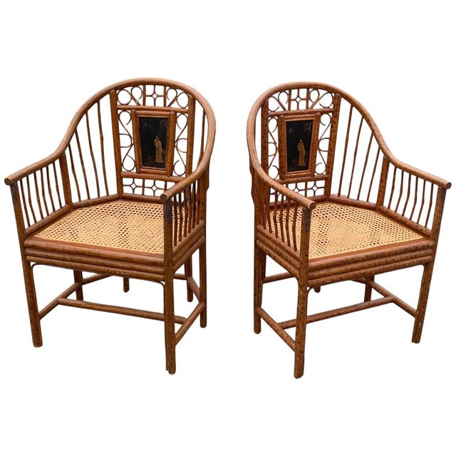 A Handmade Pair of Brighton Pavilion Chairs with Caned Seats & Painted Faux Burnt Bamboo Finished Frame. Each seat...