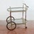 This elegant serving trolley reflects the sophisticated taste of mid-twentieth-century vintage design. Ideal as a bar or...