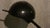 Metal desk lamp with an adjustable sphere shade. The shade is shaped like an eyelid and adjusts the brightness by moving...