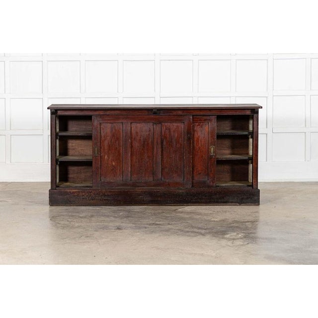 circa 1880 Large 19thC English Scrumble Painted Pine Dresser Base W198.5 x D44 x H93 cm Internal shelf depth 26 cm Weight...