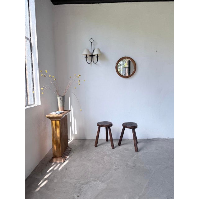 Antique pair of solid oak tripod stools. We love these stools with their thick seats and free-form shape with irregular...