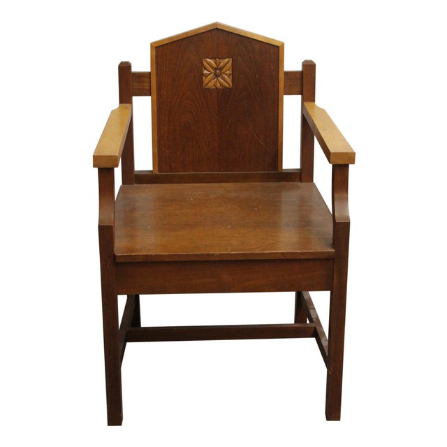 Unique Arts & Crafts dark and light wood tone chair with a small carved detail on the back. It is in overall good...