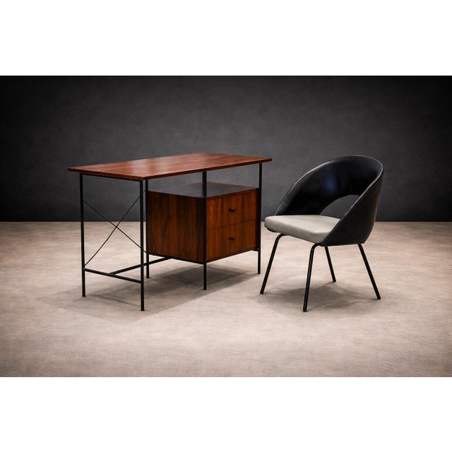 Designed by Geraldo de Barros (1923–1998), this desk and matching chair exemplify the designer’s disciplined approach to...