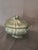 This is an exquisite pewter soup taureen with a lid. The handle is a decorative pear and leaf motif. The bowl is signed...
