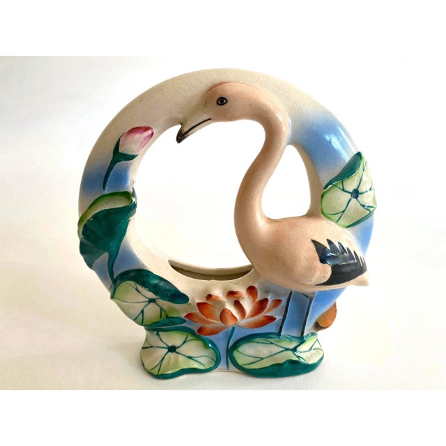 This vintage Art Deco 1940's Japan art pottery hand painted flamingo bird porcelain wall pocket vase is a very special and...