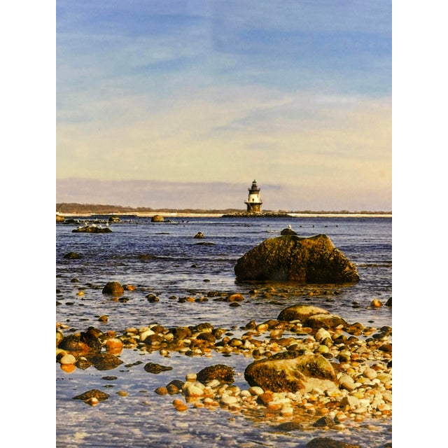 Contemporary photograph of Orient Point, New York with Orient Point Lighthouse and The Cross Island Ferry. Mounted on...