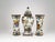 This three piece garniture set (Dutch: Kaststel) by the renowned manufacturer Oud Delftis a distinguished example of the...