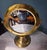 Classic vintage brass tabletop mirror. Crafted with a timeless silhouette, this piece beautifully balances functional...