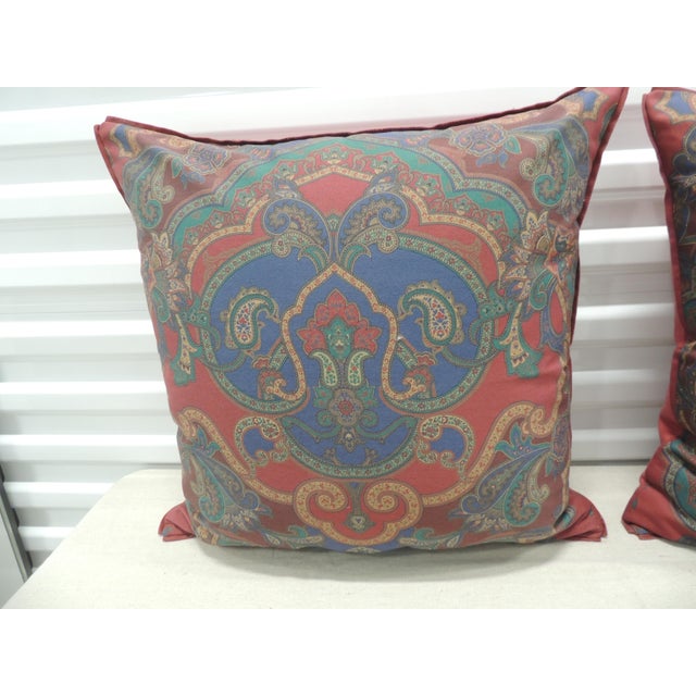 Pair of red and blue satin cotton modern decorative pillows. Medallion pattern front with soft red textured linen...
