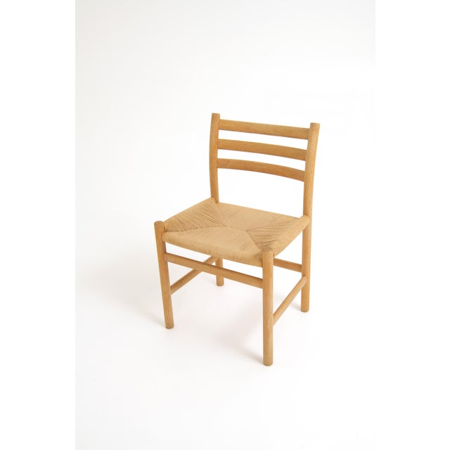 This is a set of Model 350 ladder-back dining chairs designed by Poul Volther for Soro Stolefabrik in Denmark in the...