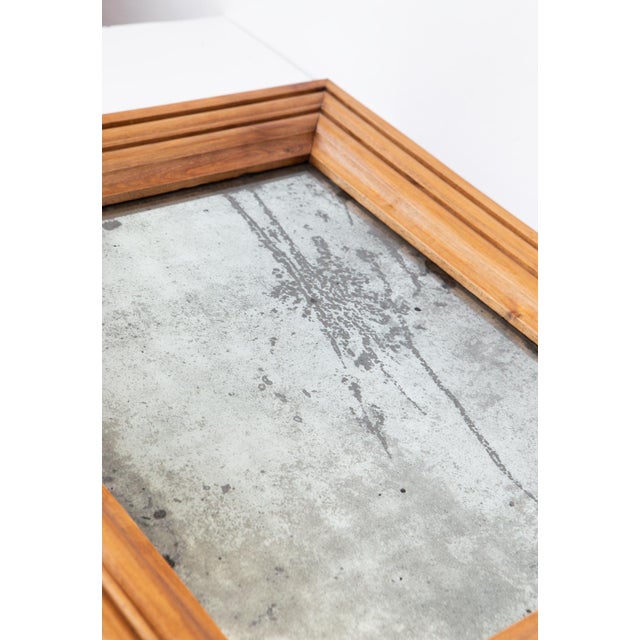 It is a Charles X - Louis Philippe style mirror from approximately 1830-1840. The mercury glass mirror is original. The...