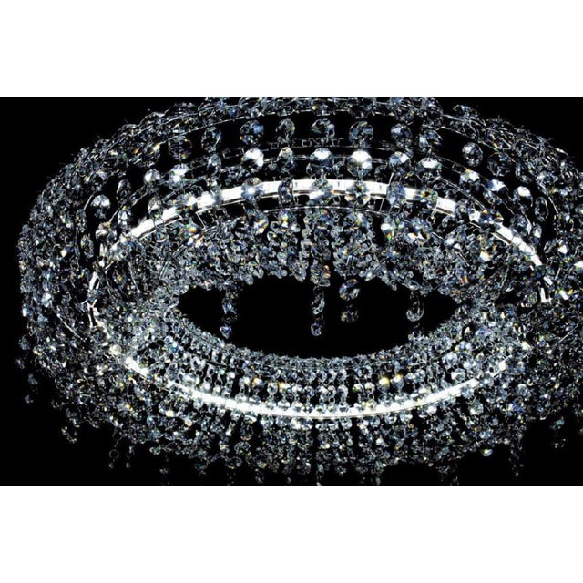 Avantgarde crystal pendant lamp by aggiolight dimensions: d 90 x h 16 cm. Materials: polished chrome metal, crystal. All...