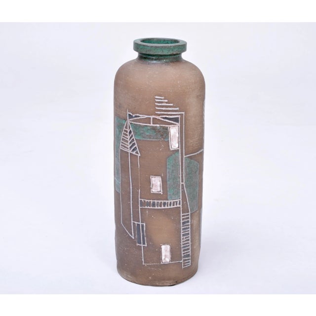 Mid-Century vase made from stoneware with beautiful graphic decor and ceramic glazing.