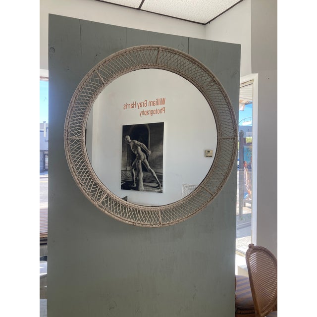Wicker and Rattan Round Mirror form the 1950's . Hand woven on a steel Frame to give a 3 dimensional effect. Beautiful...