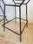 Iconic black wire bar stools designed by Harry Bertoia for Knoll featuring a grid construction seat and back sculpted from...