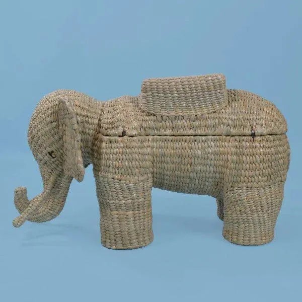 Mario Lopez Torres Elephant Trunk (Medium). There are minor imperfections to the hand-made woven rattan. Signed Mario...